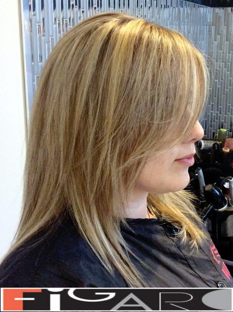 Layered medum length haircut done by Elena Bogdanets Toronto